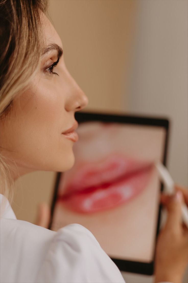 Provider reviewing a treatment plan on a tablet during a consultation
